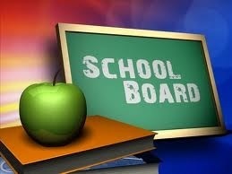 apple on books, with a chalk board that says "School Board"