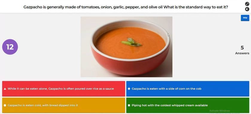 Image of game show board with question "Gazpacho is generally made of tomatoes, garlic, pepper.  What is the standard way to eat it?"
