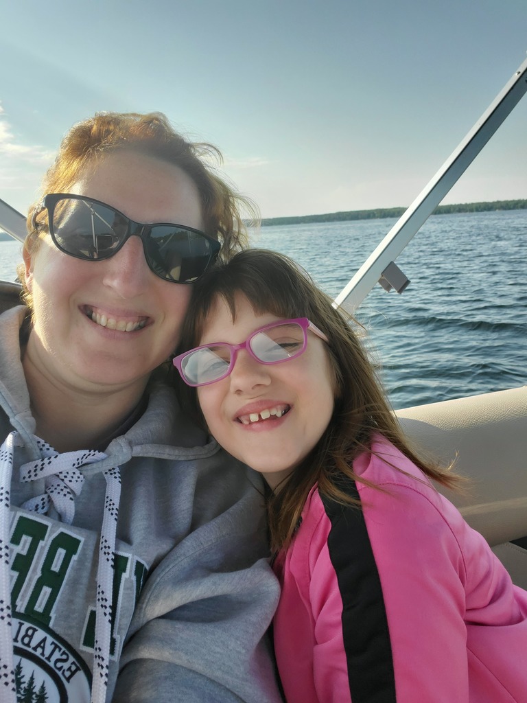 A mom and Daughter on a boat