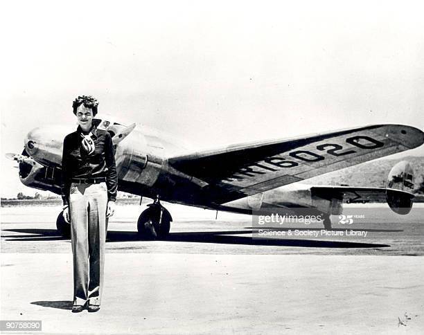 Amelia Earhart next to her plane.  Image by gettyimages.